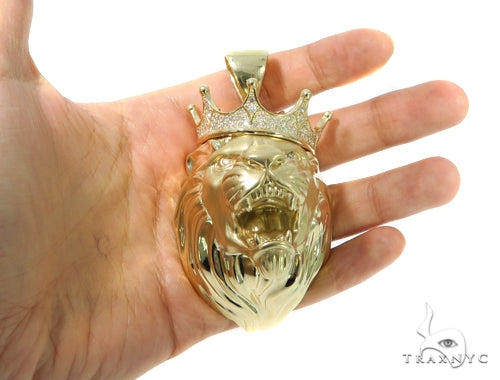 Large yellow gold lion head pendant with crown and detailed mane, men's jewelry statement piece