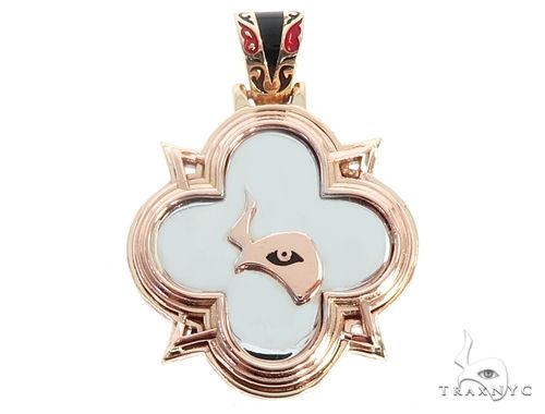 Rose gold TraxNYC mini logo pendant with clover shape and detailed bail design