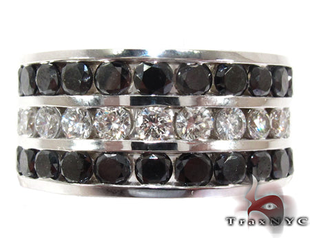 Men’s white gold ring with channel-set black and white diamonds in three rows