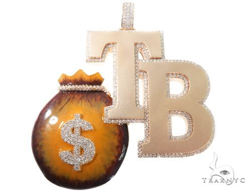 Custom diamond money bag pendant in yellow gold – front view showing diamond-set surface and bag silhouette
