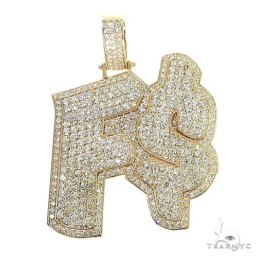 Custom 14K gold diamond pendant – front-facing view showing diamond setting and gold metalwork