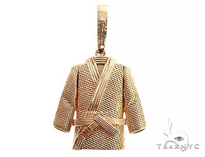 Custom 14K yellow gold Gi pendant – front-facing view showing shaped silhouette and polished surface