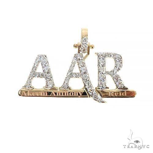 Custom 'AAR' diamond initial pendant in 14k gold – front view showing letter form and diamond setting
