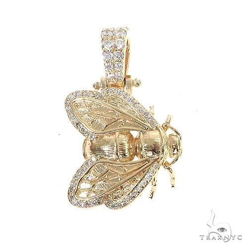 Yellow gold bee pendant with diamond accents and detailed wings, custom crafted design