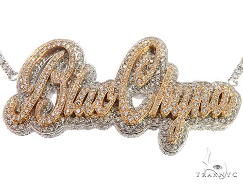 Custom two-tone gold pendant with round diamond accents, 46.40 grams