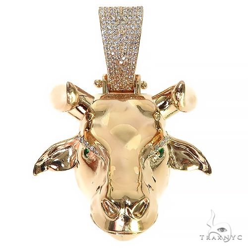 Custom bull pendant in gold with round-cut prong-set diamonds, front profile view