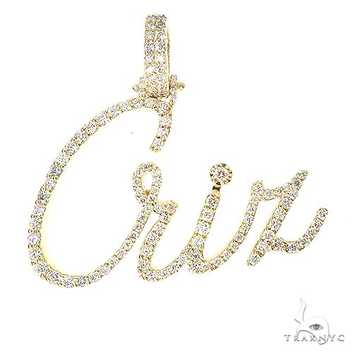 Custom diamond name pendant spelling 'Criz' in yellow gold with pavé-set diamonds – front view