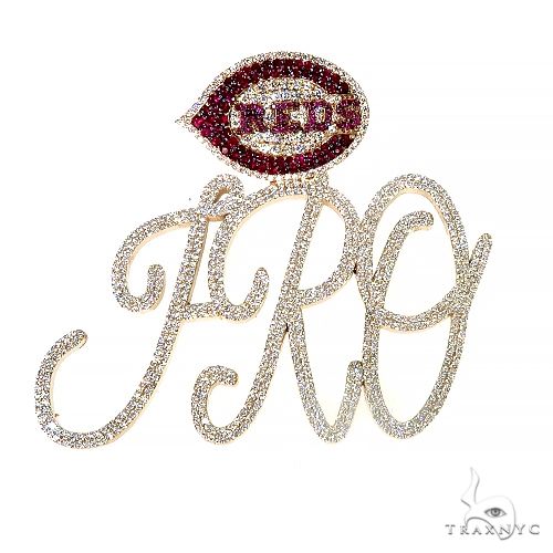 Custom diamond 'FRO' pendant in yellow gold – front-facing view showing diamond-set sculpted relief