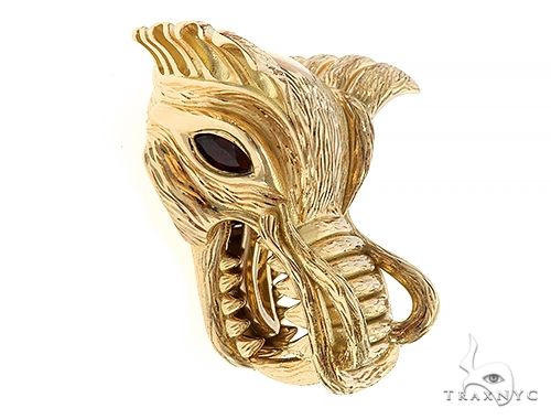 Gold-tone dragon head money clip with detailed scales and black eye accents