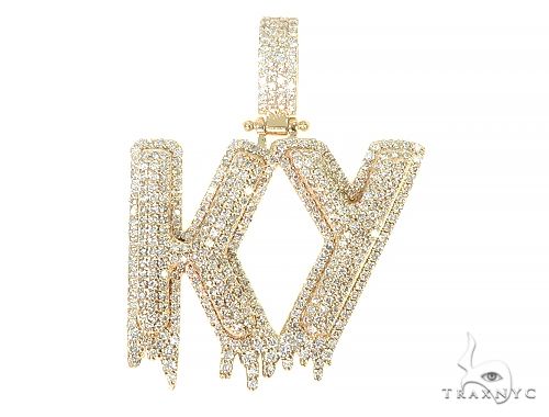 Custom diamond initial pendant in yellow gold – KY Drip letter design with diamond pave setting, front view