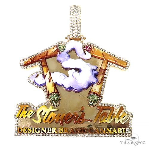 Custom diamond logo pendant in gold with prong-set diamonds – front view