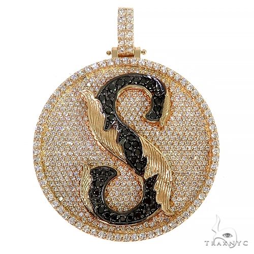 Yellow gold round diamond pendant with black diamond initial "S" and textured wing detail