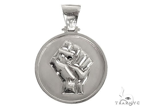 Solid white gold pendant with raised clenched fist symbolizing people power