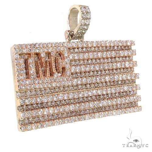 Rose gold rectangular pendant with "TMC" and diamond-studded stripes