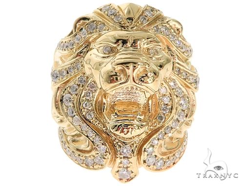Yellow gold lion head ring with detailed mane and diamond accents