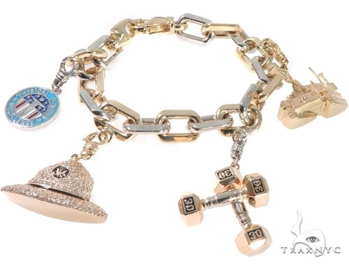 Custom gold bracelet with diamond-set military charm details