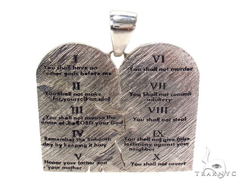 silver decalogue pendant with engraved Ten Commandments text, front-facing view