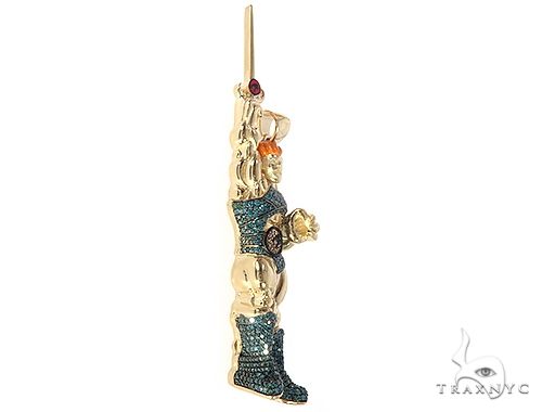 Yellow gold ThunderCats lion pendant with red gemstone eye and textured details