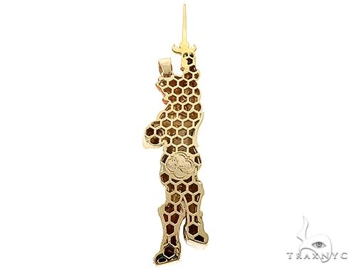 Yellow gold-toned lion pendant with detailed textured pattern and cutout design