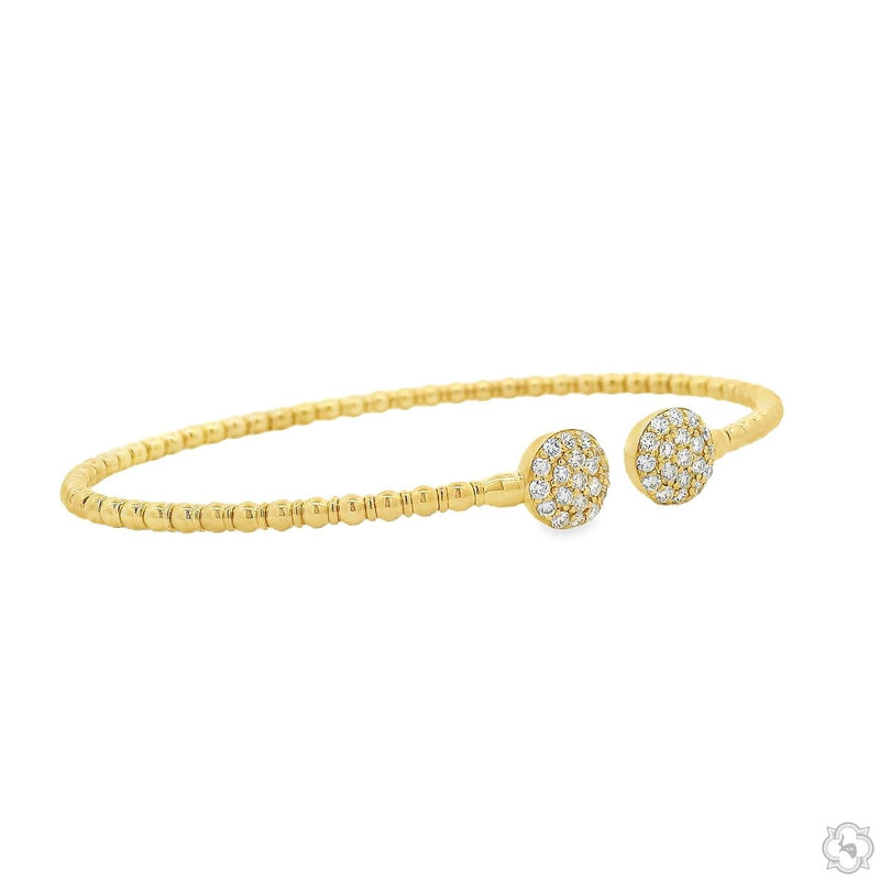 Yellow gold open bangle bracelet with diamond-studded round bead ends for women