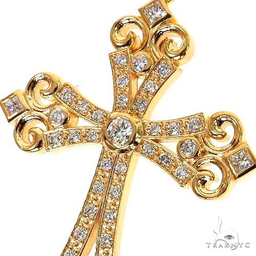 Yellow gold men's cross pendant adorned with multiple round and square diamonds