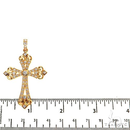 Yellow gold diamond cross pendant with intricate filigree and heart-shaped details, 2-inch size