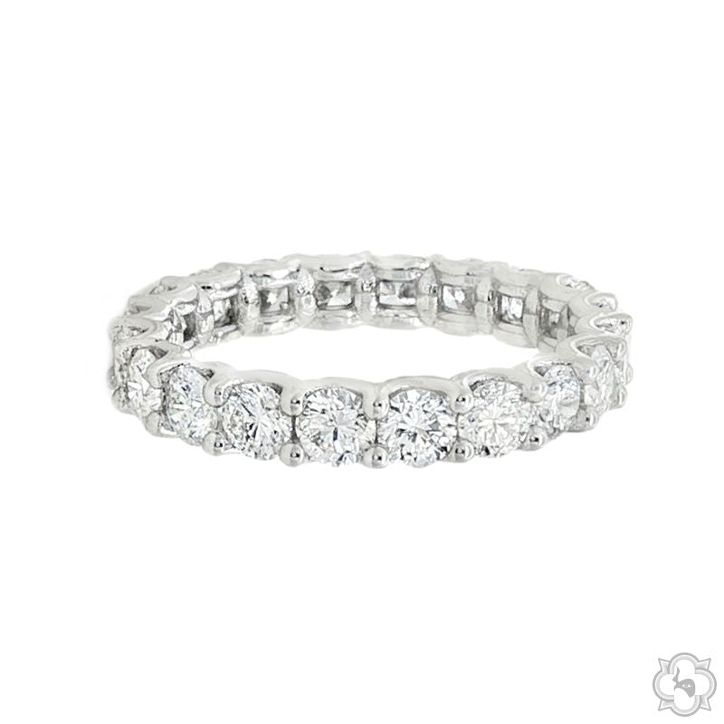 White gold 3mm diamond eternity band with round-cut stones in a continuous setting