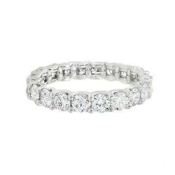 White gold 3mm diamond eternity band with round-cut stones in a continuous setting.