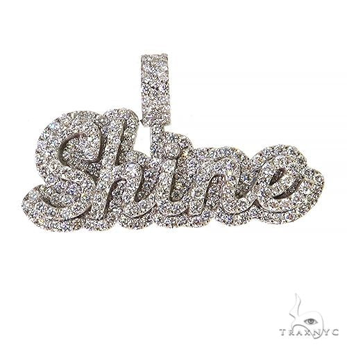 Custom diamond name pendant in 14k gold with round-cut diamonds in prong settings, front view