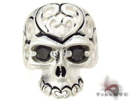 Silver men's ring with detailed skull and ornamental engravings