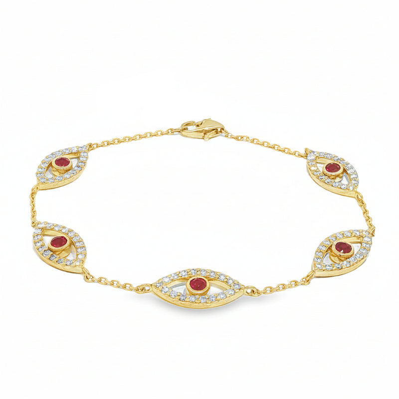 Gold bracelet with five evil eye charms featuring white diamonds and central rubies