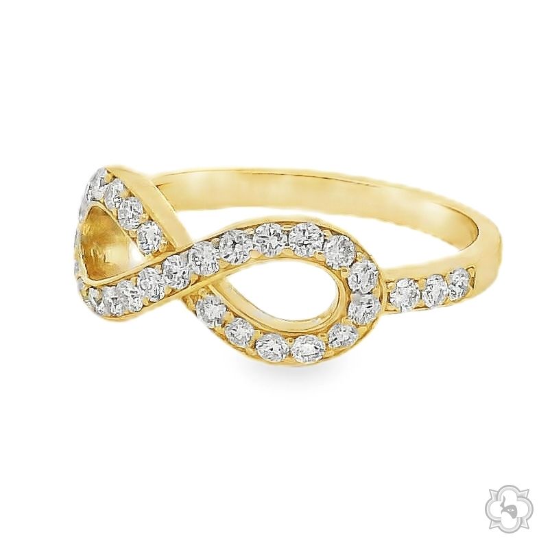 Yellow gold ring with diamond-studded infinity symbol band