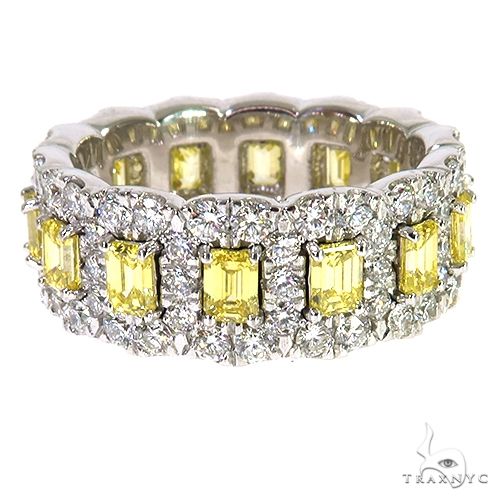 White gold eternity ring with rectangular yellow diamonds and round white diamonds
