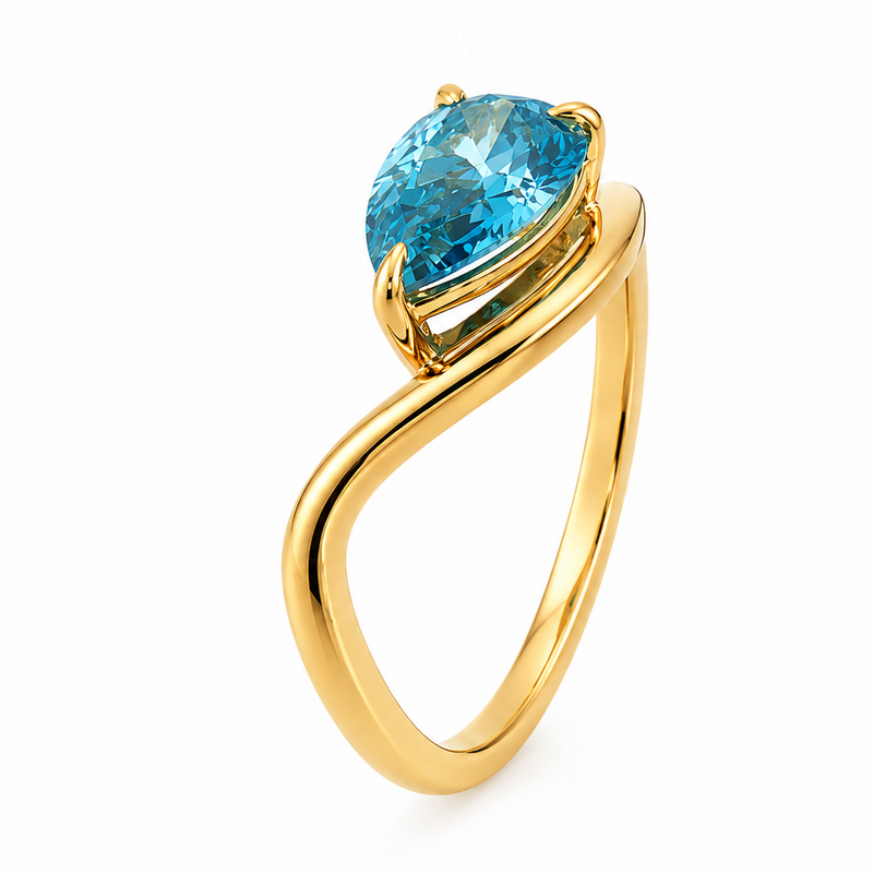 Yellow gold ring with a pear-shaped vivid blue diamond and a twisted band design