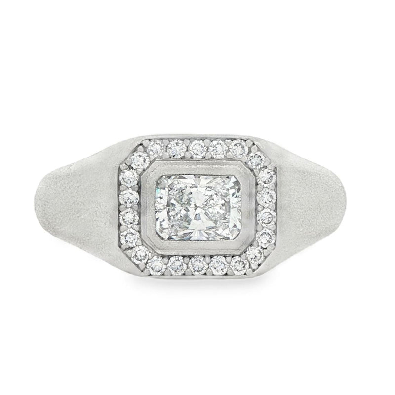 Men's silver ring with rectangular center diamond surrounded by smaller diamonds