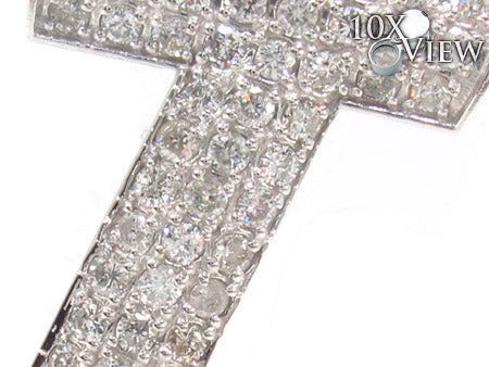 White gold diamond-encrusted pendant shaped as initial "I" with a polished bail