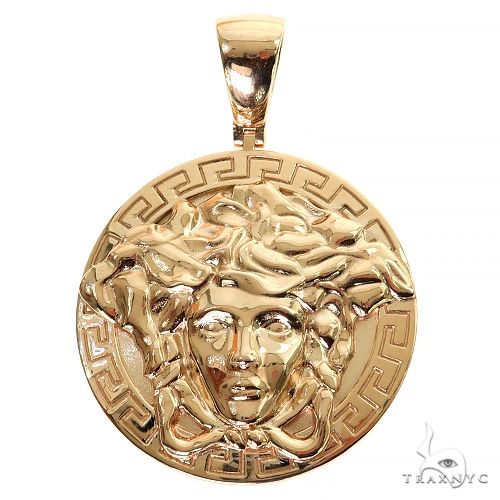 Yellow gold Gorgon Medusa pendant with intricate snake detailing and Greek key border