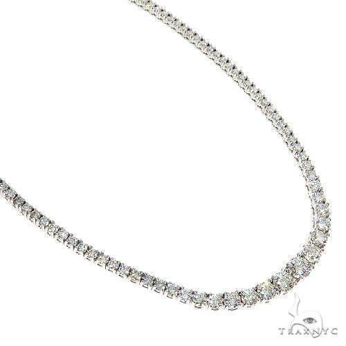 Graduated diamond tennis necklace in white gold with larger center stones