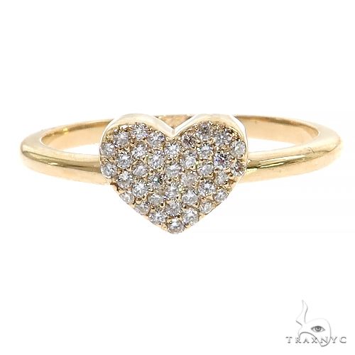 Yellow gold ring with heart-shaped cluster of small sparkling diamonds