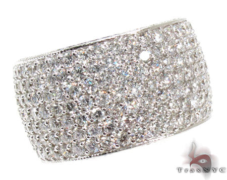 Wide men's ring with multiple rows of sparkling white diamonds in white metal band