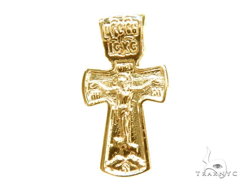 Yellow gold men's crucifix cross pendant with detailed figure and ornate design