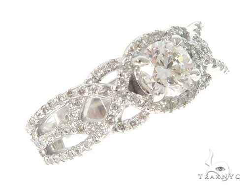 Infinity diamond engagement ring in 14k yellow gold with round stones set along a continuous band