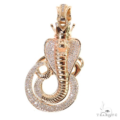 Diamond cobra snake pendant in white and yellow gold tones – detailed scale texture, coiled strike pose, front angle