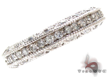 Ladies gold wedding ring with round diamonds in open prong settings