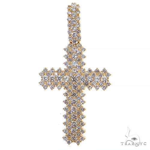 Yellow gold cross pendant encrusted with multiple round lab diamonds in a clustered design