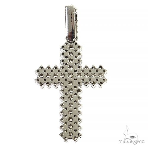 Large white gold cross pendant with raised diamond-shaped pattern and polished bail