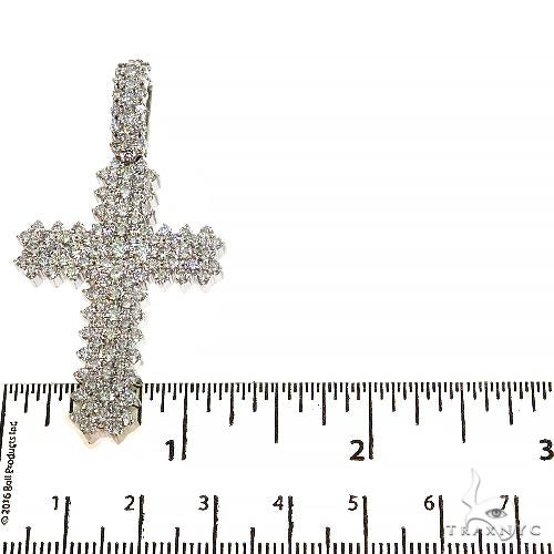 Large white gold cross pendant encrusted with lab diamonds, about 2 inches tall