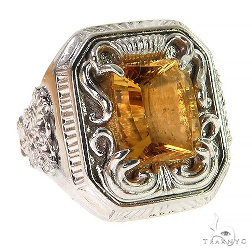 Silver men's ring with large rectangular citrine stone and intricate scrollwork detailing