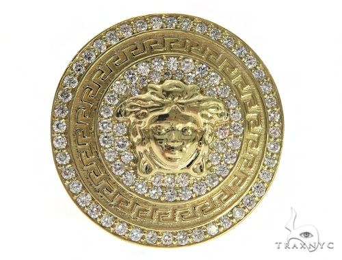 Yellow gold men's ring with diamond-studded Medusa head and circular Greek key pattern