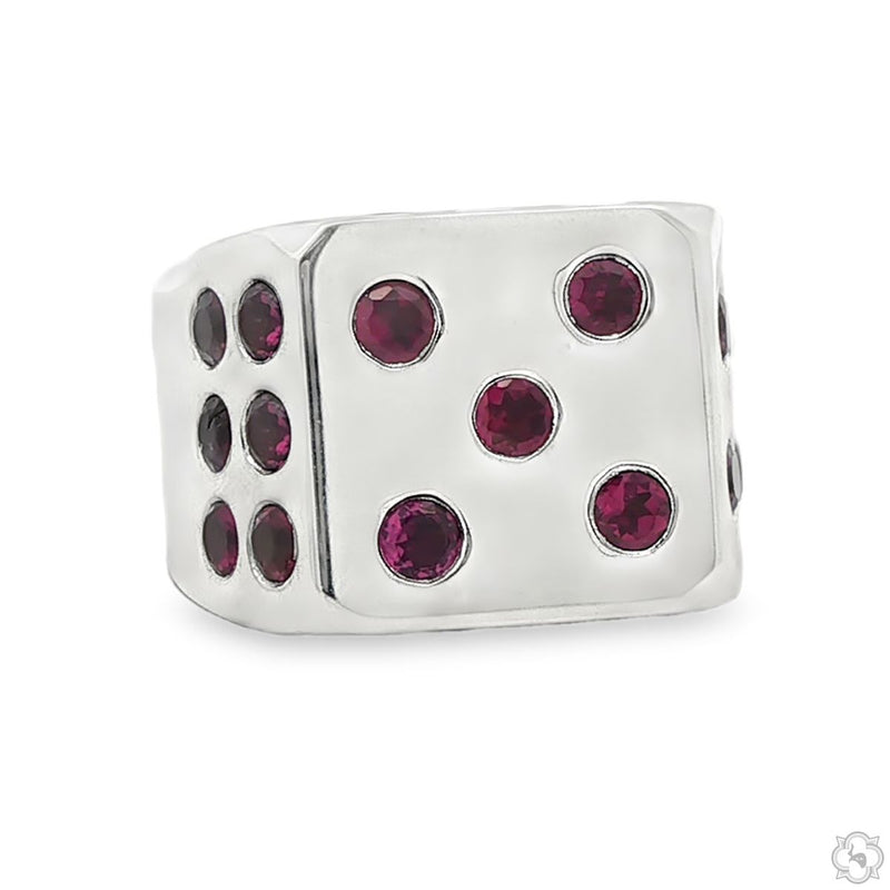 Silver men's ring shaped like a dice with red ruby gemstone dots on all sides